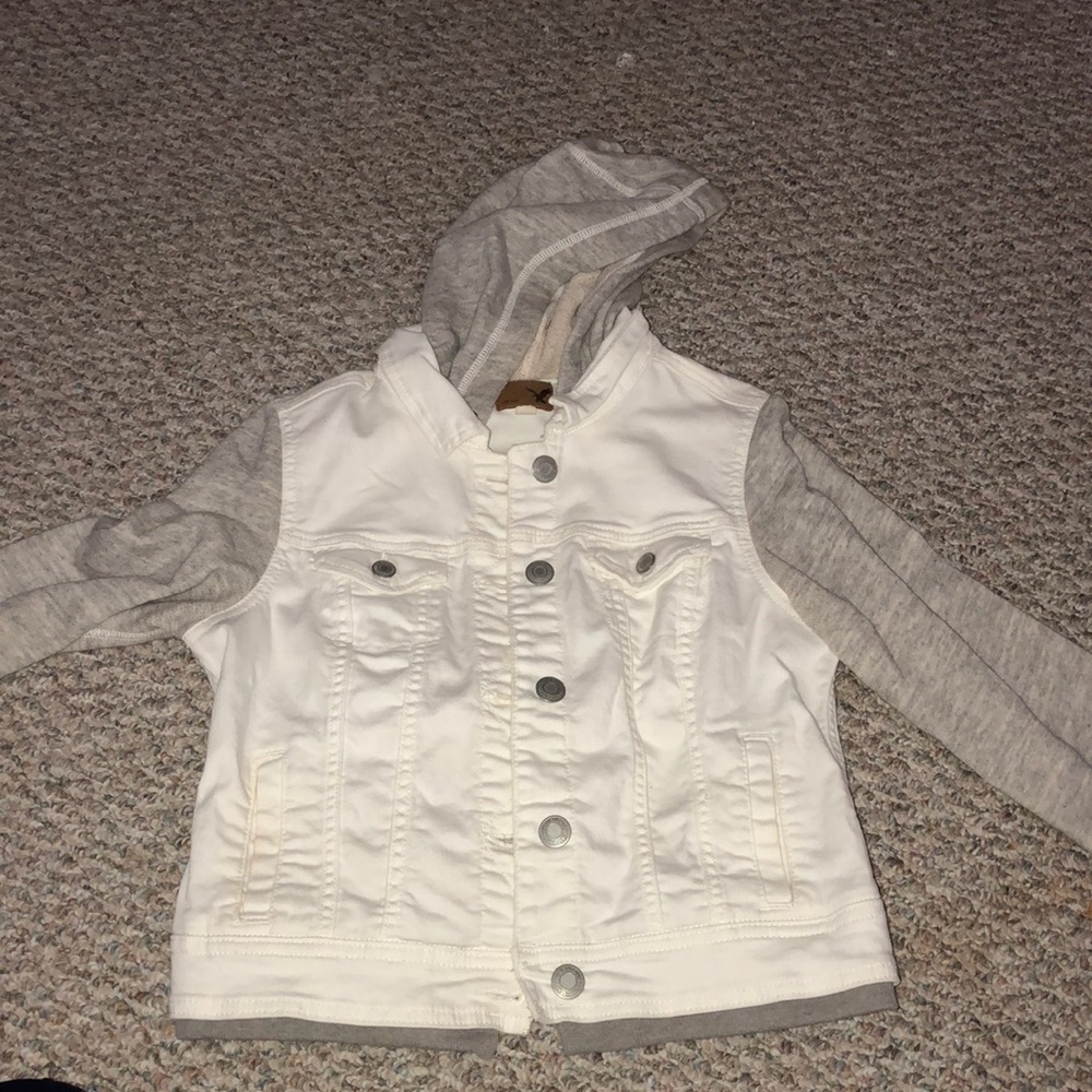 White jean jacket with grey sweatshirt attached